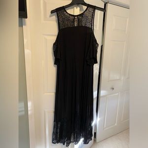 Beautiful, flowing black dress.  Off the shoulder sleeves. Torrid size 1.